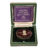 AN ELIZABETH II SILVER JUBILEE OVAL TRINKET BOX