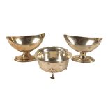 A PAIR OF GEORGE III SILVER OVAL SALTS