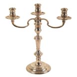 AN ELIZABETH II SILVER THREE BRANCH CANDELABRUM