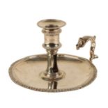 A GEORGE III SILVER CHAMBERSTICK