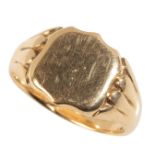 A GENTLEMANS GOLD SIGNET RING