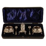 A VICTORIAN SILVER THREE PIECE CRUET SERVICE