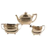 A GEORGE III HARLEQUIN SILVER THREE PIECE TEA SERVICE