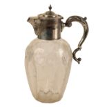 A GEORGE V SILVER MOUNTED CLARET JUG