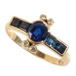 A SAPPHIRE AND DIAMOND RING