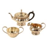 A GEORGE III/IV SILVER MATCHED TWO PIECE TEA SERVICE