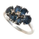 A SAPPHIRE CLUSTER RING