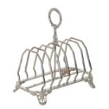 A SILVER PLATED TOAST RACK BY JOHN GILBERT