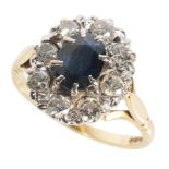 A SAPPHIRE & DIAMOND CLUSTER RING