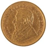 AN 1897 SOUTH AFRICAN GOLD HALF POND (POUND)