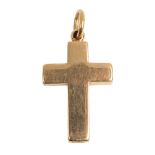 A YELLOW METAL CROSS LOCKET