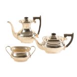 AN ELIZABETH II SILVER THREE PIECE TEA AND COFFEE SERVICE