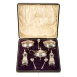 A LATE VICTORIAN SILVER FIVE PIECE CRUET SERVICE