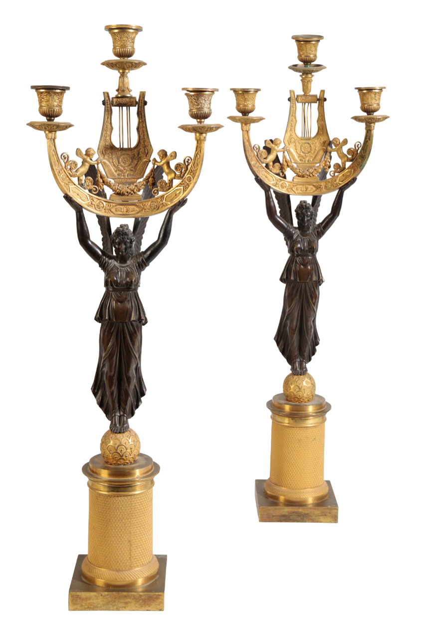 A PAIR OF FRENCH ORMOLU AND PATINATED BRONZE CANDELABRA IN THE MANNER OF PIERRE-PHILIPPE THOMIRE (17