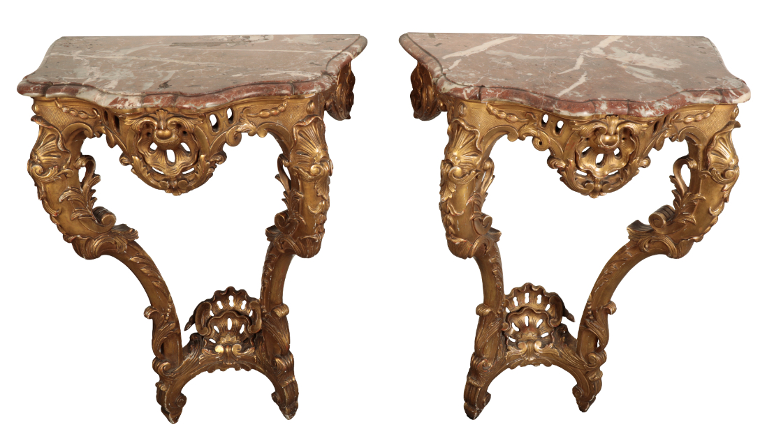 A PAIR OF LOUIS XV STYLE GILTWOOD AND MARBLE TOPPED CONSOLE TABLES