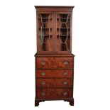 A LATE GEORGE III MAHOGANY SECRETAIRE CABINET OF SMALL PROPORTIONS
