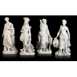 A GROUP OF FOUR WHITE-GLAZED PORCELAIN FIGURES OF 'THE CONTINENTS'