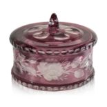 A BOHEMIAN AMETHYST OVERLAY CRYSTAL ENGRAVED CONTAINER & COVER