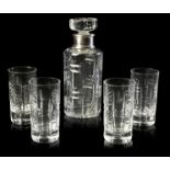 A 1950S SILVER-MOUNTED CRYSTAL DECANTER AND FOUR TUMBLERS