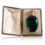 HOWELL & JAMES: A SILVER MOUNTED EMERALD CRYSTAL SCENT BOTTLE