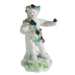 AN 18TH CENTURY PORCELAIN FIGURE OF A BACCHANALIAN CHERUB