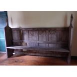 A 19TH CENTURY PINE PEW