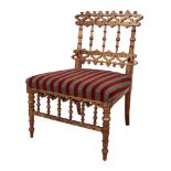 AN ITALIAN GILTWOOD AND POLYCHROME SIDE CHAIR