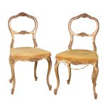A PAIR OF LOUIS XV STYLE GILTWOOD SIDE CHAIRS