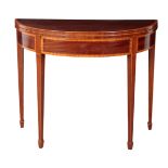 AN EDWARDIAN MAHOGANY AND SATINWOOD CROSSBANDED DEMI-LUNE CARD TABLE