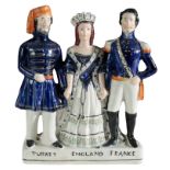 A VICTORIAN STAFFORDSHIRE POTTERY FIGURE, 'TURKEY, ENGLAND, FRANCE'