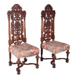 A PAIR OF VICTORIAN OAK HALL CHAIRS