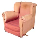 A HOWARD STYLE ARMCHAIR