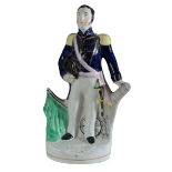 A VICTORIAN STAFFORDSHIRE POTTERY FIGURE, 'DUNDAS'