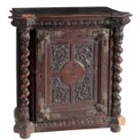 A FRENCH CARVED AND STAINED WOOD CABINET