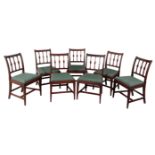 A SET OF SEVEN REGENCY MAHOGANY DINING CHAIRS