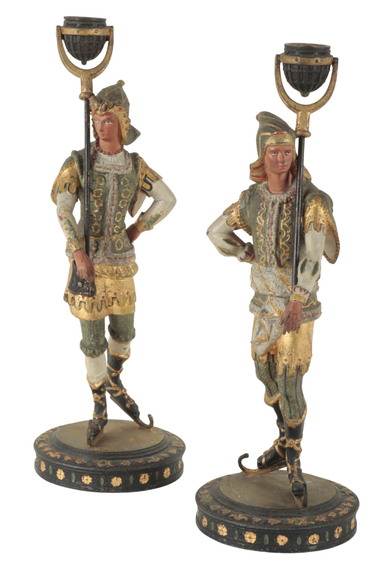 A PAIR OF ITALIAN PAINTED METAL FIGURAL CANDLESTICKS