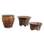 A GROUP OF THREE CERAMIC PLANTERS