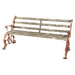 A COALBROOKDALE STYLE CAST IRON AND WHITE PAINTED GARDEN BENCH