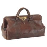 A BROWN LEATHER GLADSTONE BAG