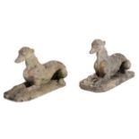 A PAIR OF RECONSTITUTED STONE GREYHOUNDS