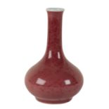 A CHINESE PORCELAIN SMALL COPPER RED GLAZED VASE