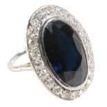 A LARGE SAPPHIRE AND DIAMOND DRESS RING