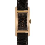 GRUEN CURVEX: A GENTLEMAN'S GOLD-PLATED WRISTWATCH