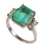 AN EMERALD AND DIAMOND RING