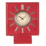 LECOULTRE: A RED MOROCCO DESK CLOCK