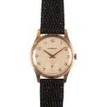 GARRARD: A GENTLEMAN'S 9CT GOLD WRISTWATCH