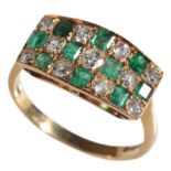 AN EMERALD & DIAMOND CHEQUER BOARD RING