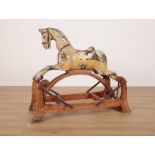 AN EDWARDIAN ROCKING HORSE BY G & J LINES OF LONDON