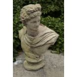 A COMPOSITE STONE BUST OF APOLLO BELVEDERE