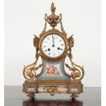 A VICTORIAN GILT METAL MANTEL CLOCK BY JOHN HALL & CO OF MANCHESTER